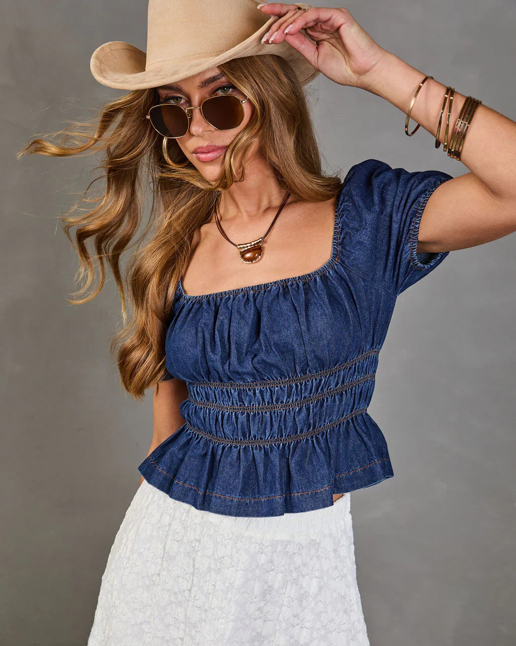 Navelle Smocked Denim Peplum Top
