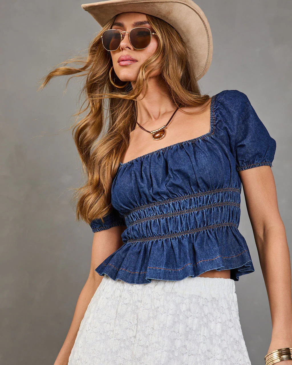 Navelle Smocked Denim Peplum Top